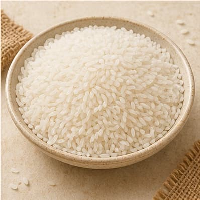 White rice grains in a ceramic bowl